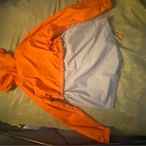 Woman’s Amazon Rain Jacket size s in orange and grey